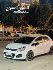  1 كيا ريو موديل 2013متور 1400تيربو ديزل اصل عمومي سياره بسعر حرق على كاش فقط