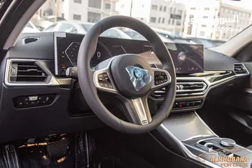  8 Bmw i3 e-drive 40L Ev M kit 2024 ( night)  كفالة 3 سنوات او 50,000 كم