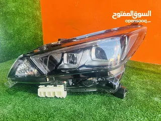  2 اضوية امامية نيسان ليف 2018-2024   وارد اليابان وامريكي عاكسة بيضه  ضوء امامي نيسان ليف 2020 ياباني