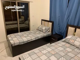  21 شارع الجامعة - شقة مفروشة ارضي غرفتين شامل المياه والإنترنت للإيجار من المالك مباشرة