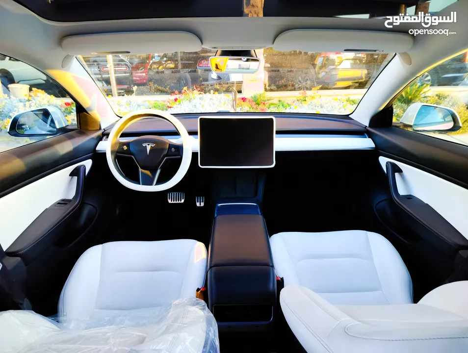 تيسلا 2021 model 3 فحص كامل 4 جـيـد فرش ابيض جنط 19بحالة الوكالة لون مميز للبيع بسعر لقطة ومحروووق