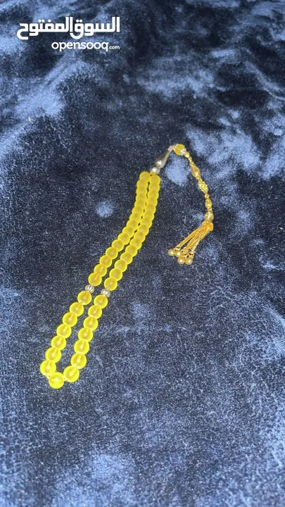 مسباح سبحة حجر الون اصفر و احمر   فقطط او العرض الثنتين