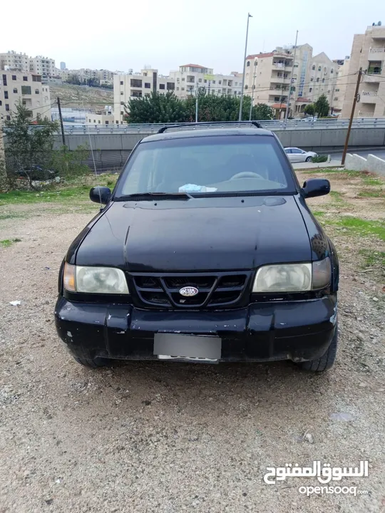 كيا سبورتج 2001 لون اسود للبيع