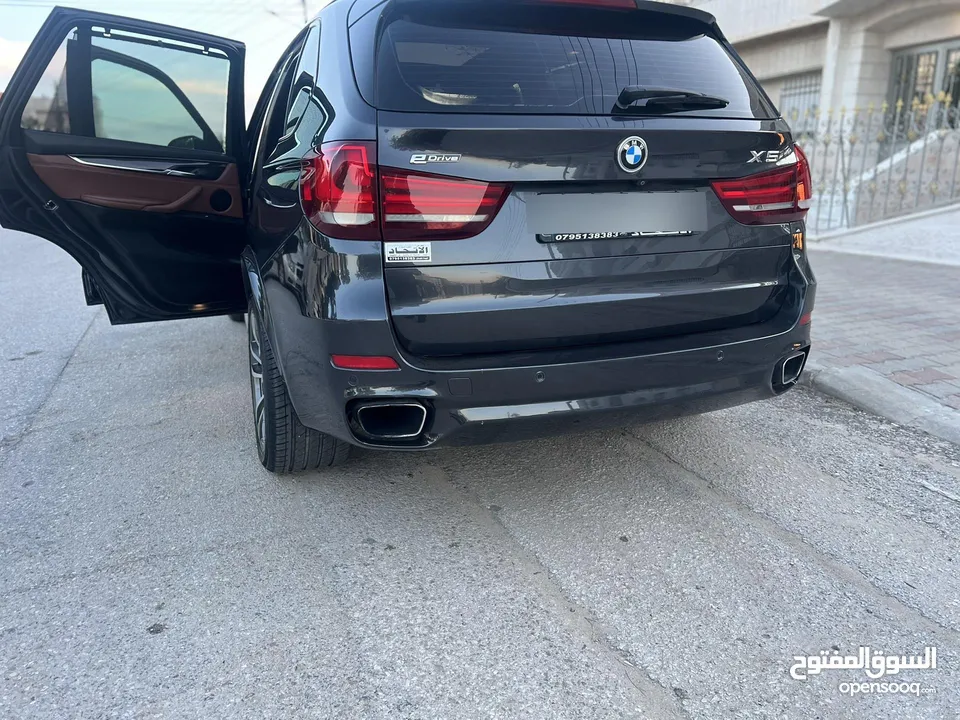 بي ام دبليو X5 بلج ان وارد وكاله عمان  فل كامل فحص كامل بحاله الوكاله دهان الشركه