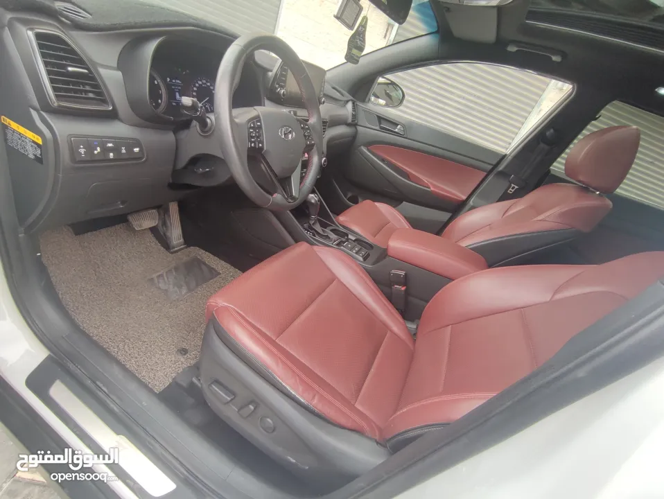 هونداي توسان فل الفل اضافات دهان شركة وعداد أصلي 70000كم فقططط رخصة وتأمين شامل للبيع بسعر مغري