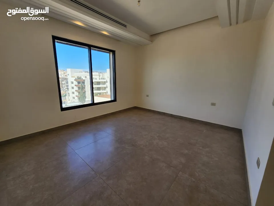 شقة طابقية فاخرة للبيع في عبدون  ref : 14389