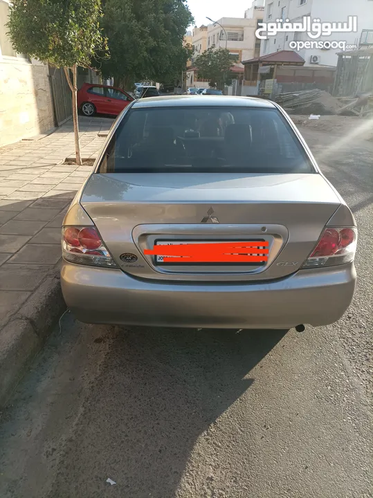 ميتسوبيشي لانسر موديل 2005 العقبة  4500وضعها ممتاز الحمدلله. قير توماتيك