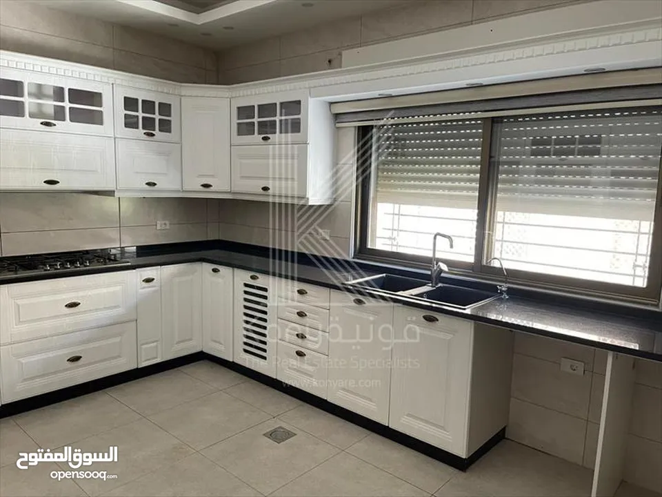شقة مميزة للبيع في عمان - تلاع العلي- طابق أرضي