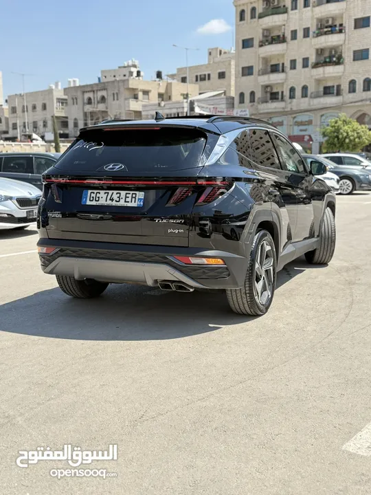 هونداي توسان ترخيص 2022 محرك 1600 هايبرد plug in/يقطع على الشحنه 52 كيلو متر