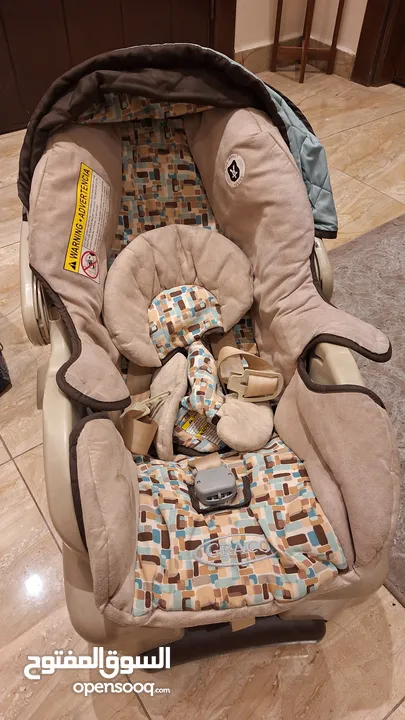 عرباية اطفال نوع Graco مع car seat نوع Graco وكراجة اطفال نوع mamalove