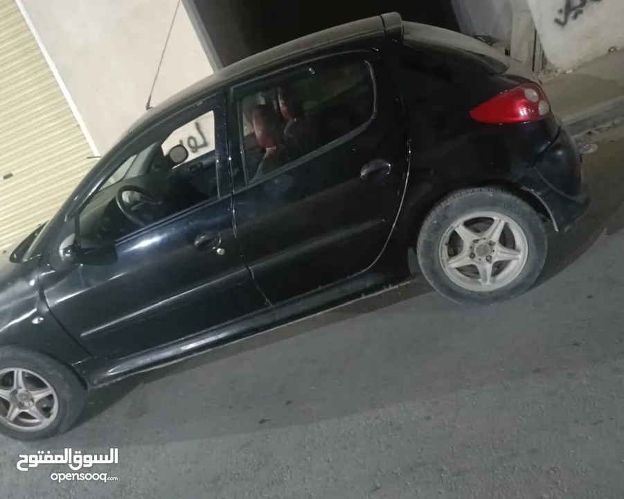 بيجو 206 بلص