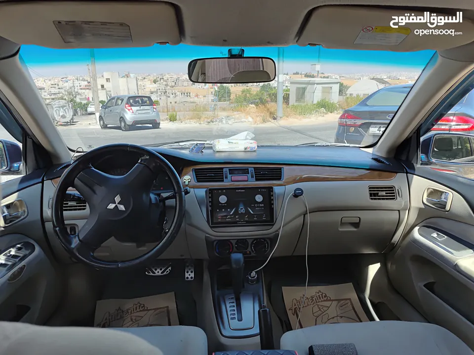 متسوبيشي لانسر GLX 2007 1600 cc وارد الخليج الكويت جميع الإضافات بإستثناء الفتحه وجنط إضافي.