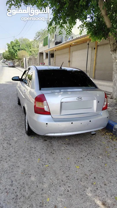 هونداي فيرنا 2006 مع كامل الإضافات الداخلية (شاشة، كاميرا، بلوتوث،)  باقي المواصفات في الوصف...