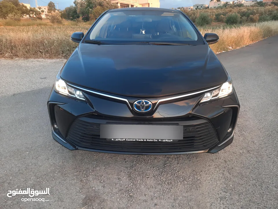 تويوتا كورولا هايبرد موديل 2023 بحالة الوكاله وارد وصيانه المركزية تويوتا .