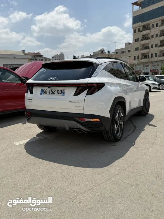 هونداي توسان ترخيص 2022 محرك 1600 هايبرد plug in/يقطع على الشحنه 52 كيلو متر