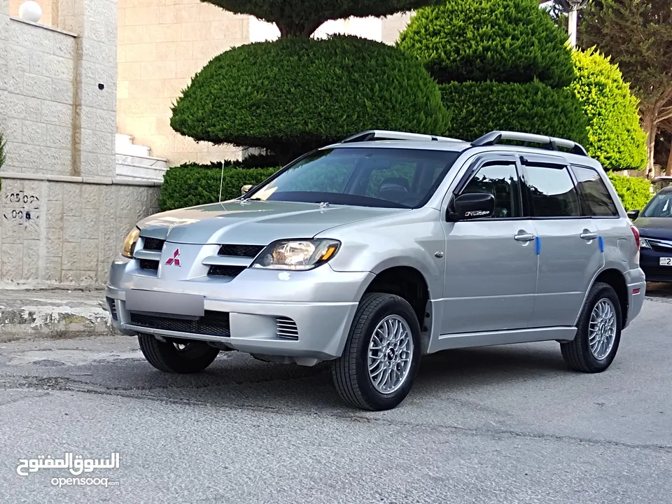 ميتسوبيشي آوتلاندر اوتوماتيك 2003 توب نظافة بسعرررر مميززز محرك 2400cc