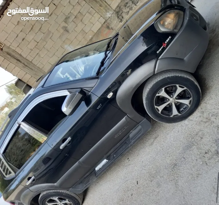 توسان 2008  ماطور 2000 / 20 صباب  لون اسود