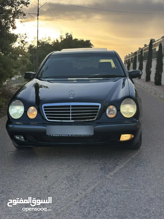 E200. 2002  قرش ونص 2002  رقم الهاتف بالوصف