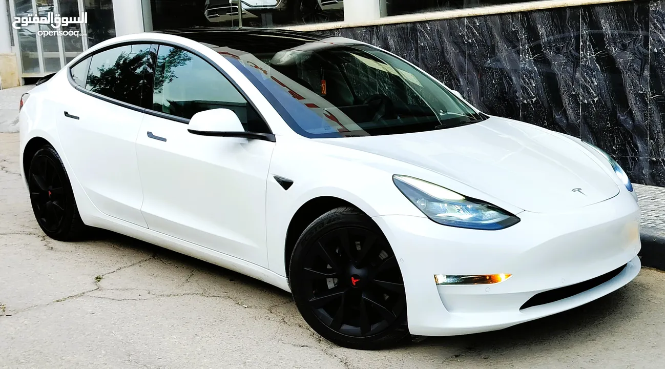 تيسلا 2022 model 3 فحص كامل 4 جـــيـــد بدون ملاحظات بودي (كرت ابيض) بحالة الوكالة بسعر لقطة ومحرووق