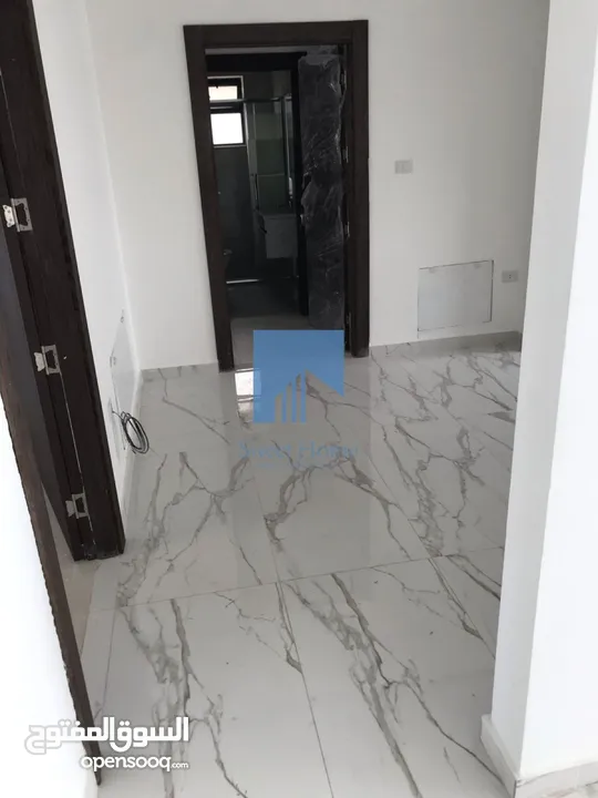 شقة أرضية فاخرة للبيع في الجندويل 130م مع ترس 40م تشطيب سوبر ديلوكس لم تسكن