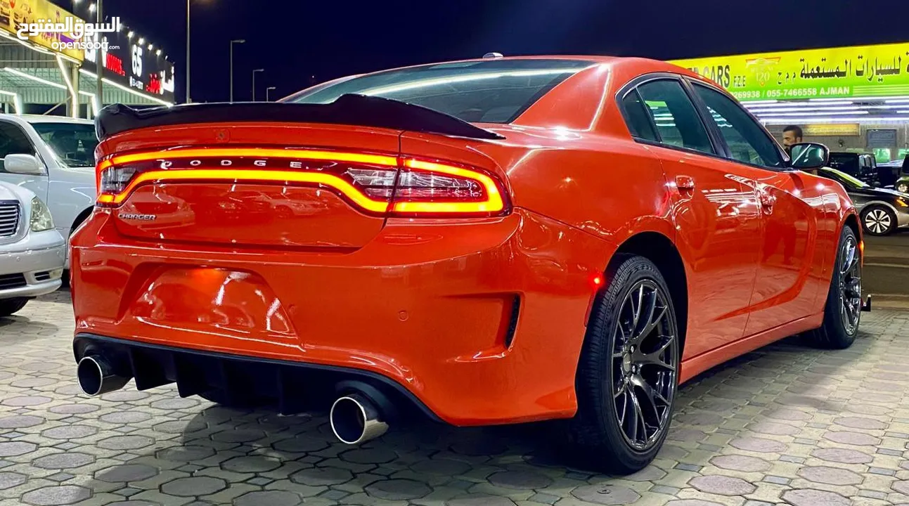 Dodge charger Model 2019 Color orange interior black passing guaranty