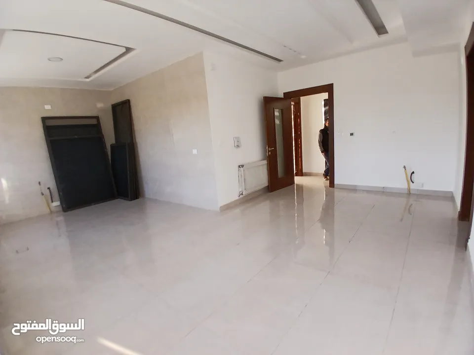 شقة دوبلكس للبيع في ضاحية الامير راشد جديدة لم تسكن