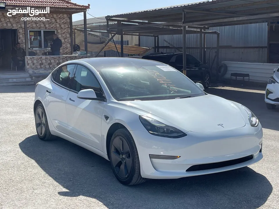 Tesla model 3 2023 لون آبيض لؤلؤي