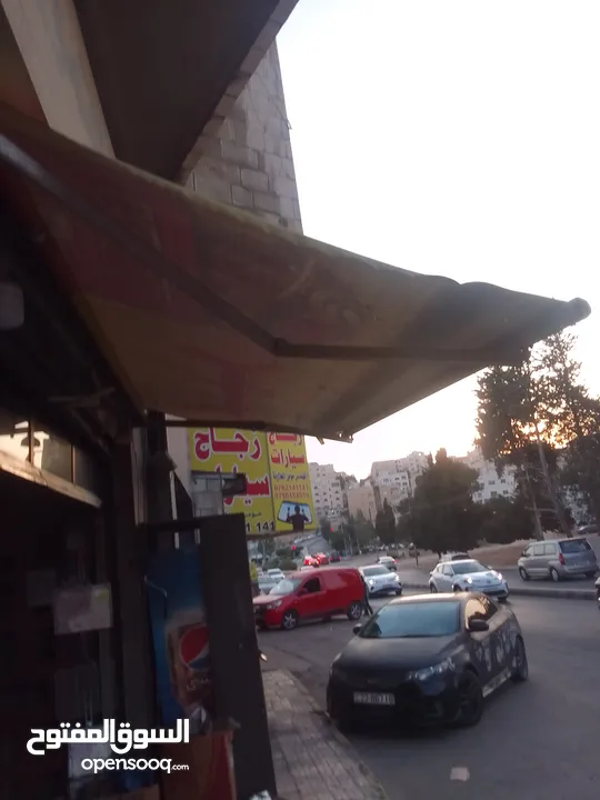 ثلاجة بيبسي الشكل الجديد والعريض ومظلة محل