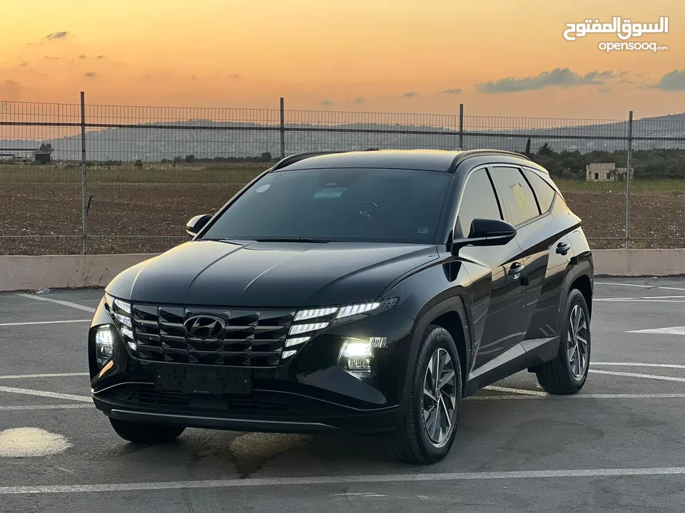 هونداي توسان/2022 فل الفل بدون فتحة سقف  2x4 ///240Hp بنزين + كهرباء  ( Haybrid) 1600cc