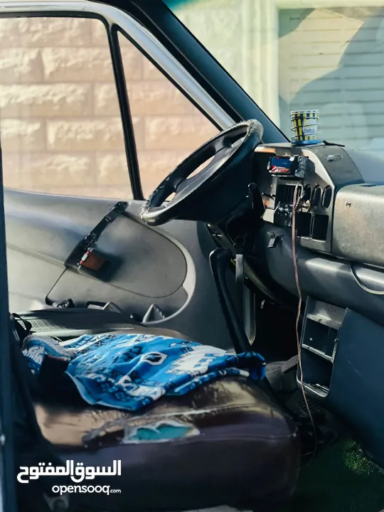 تمام  الباص نظيف ما فيه ضربات  اصل تجاري نظيف ضريبة  موديل 2000  باب سحاب على الجنب  شصي نظيف  بققص