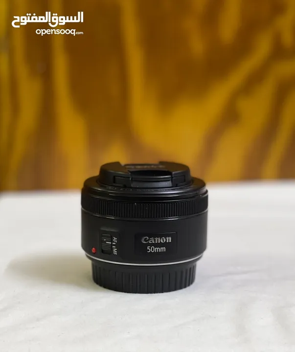 كاميرا كانون 850D مع عدسة 50mm  وعدسة كت 55_18