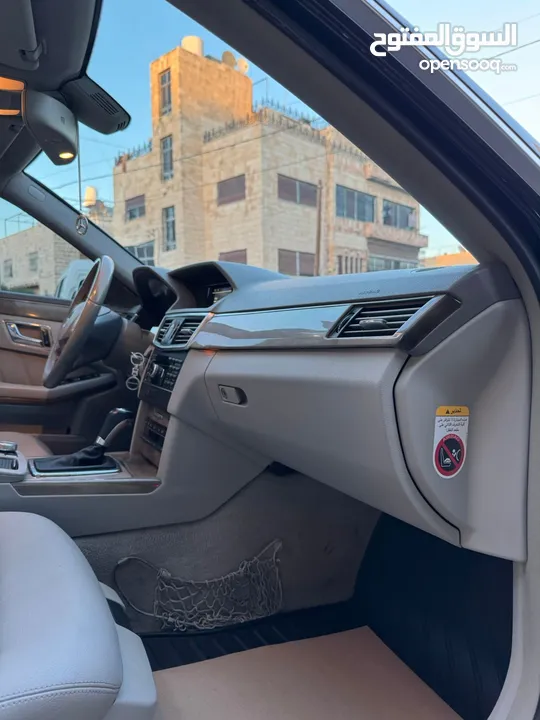 مرسيدس E200  cgi فل كامل عداد قليل  افنجارد فحص كامل  افنجارد بانوراما بسعر مغري
