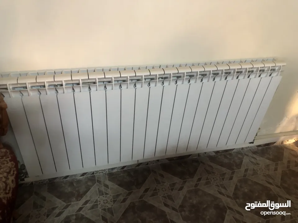 ماطور تدفئة مركزية مع خزان سولار مع الراديترات (المشعاعات)