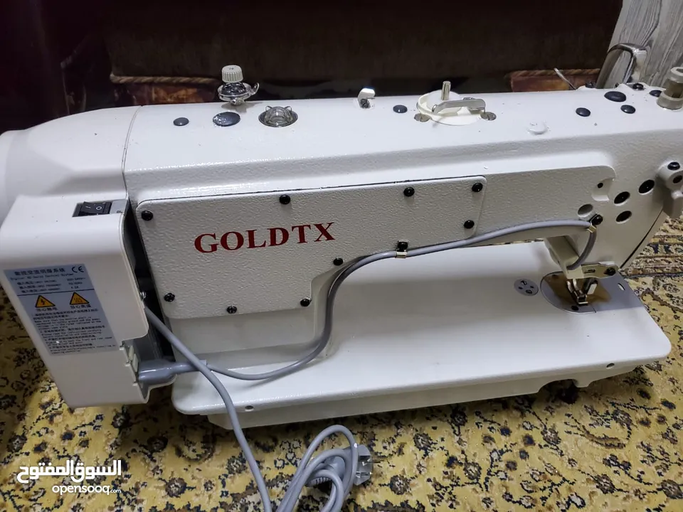 ماكينة خياطة Goldtex (jaki) لساتها بكرتنوتنها جديدة لسا مش مشبكة عليها لوحة