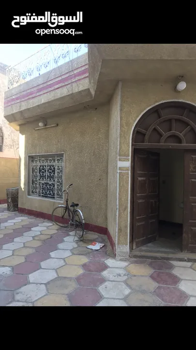 بيت مع بنايه طابقين على شارع تجاري الموفقية الاملاك قرب محلات محمد البغدادي