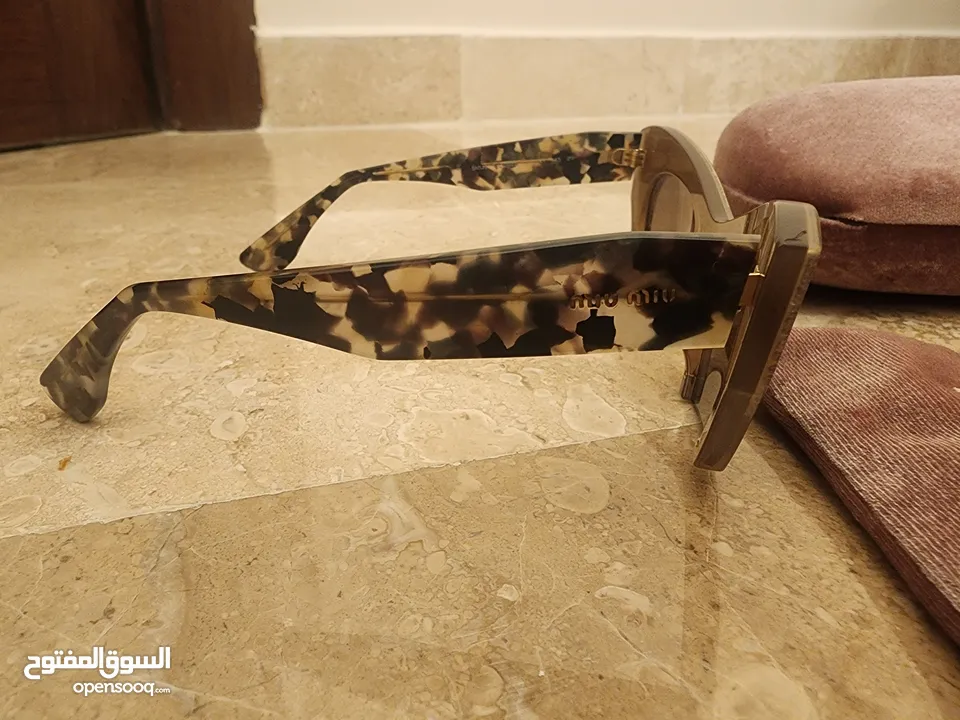 نظارات شمسية ماركة miu miu