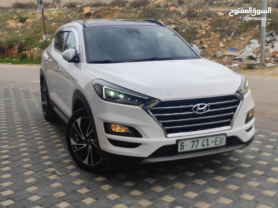 هونداي توسان فل الفل اضافات دهان شركة وعداد أصلي 70000كم فقططط رخصة وتأمين شامل للبيع بسعر مغري