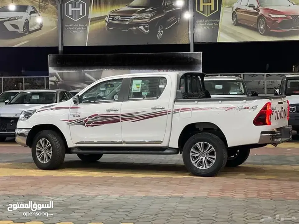 تويوتا هايلكس S-GLX اعلى المواصفات باللون الابيض المميز 2024