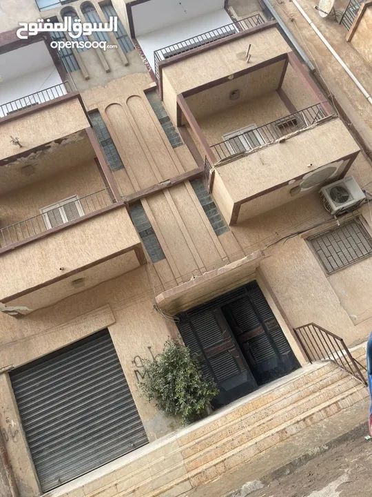 عمارة ثلاث طوابق في حي الصلابي قرب المستشفي العسكري المساحة 245 شهادة عقارية