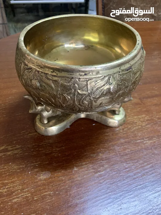 جاط ومقص وشكل طائر نحاس