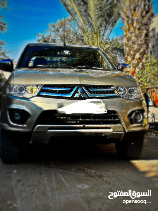 تندر متسبيشي L200 دفع خلفي 4x2 الحالة نظيف و السعر قابل لتفاوض مطور قير نظاف نظاف