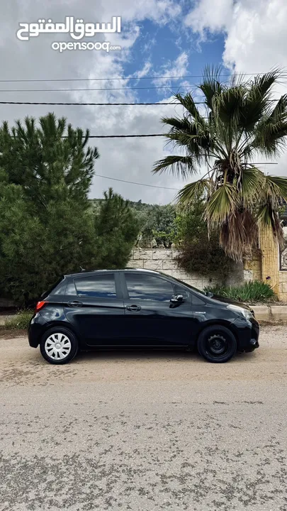 تويوتا يارس هايبرد 2015 فحص 7 جيد بحالة ممتازة - Toyota Yaris Hybrid Hatchback 2015