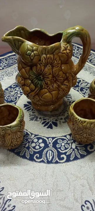 طقم ابريق و 6 كاسات فخار انتيك