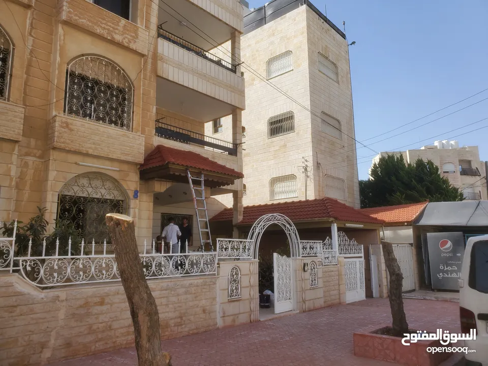 مؤسسة نعمان لتشكيل المعادن حداد متنقل قرميد زينكو حمايات أبواب وشبابيك مظليات برجولا دربزين