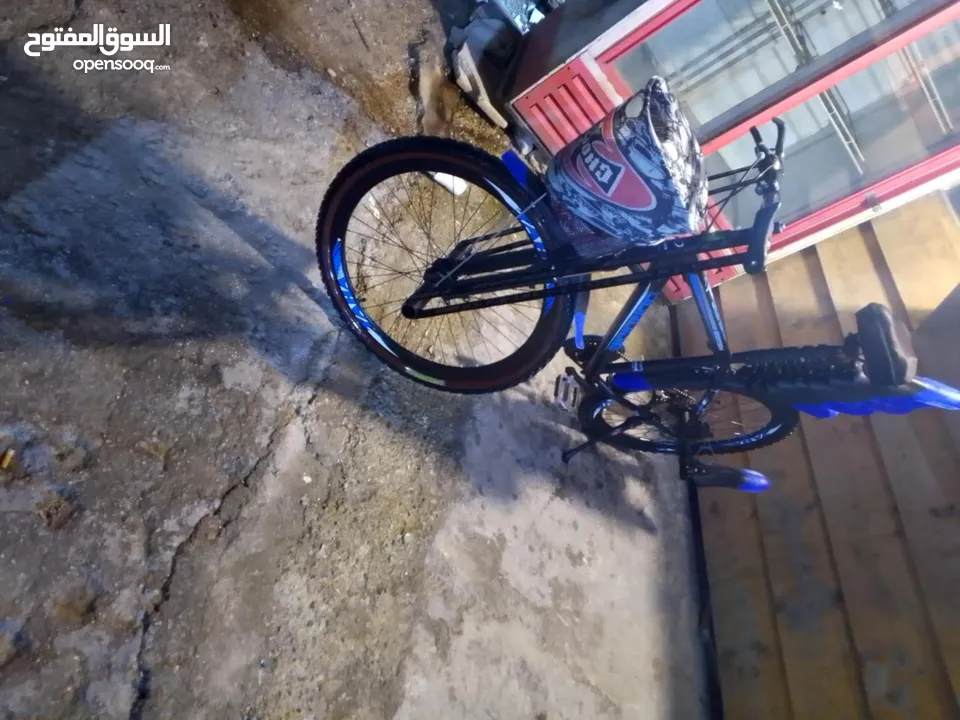 بيع بسكليت بحاله جيده جدااا اللون اسود وازرق واضح بالصوره غيارات شغاله وبرك شغال 100%