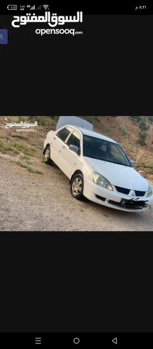 لانسر موديل 2010  لونها ابيض