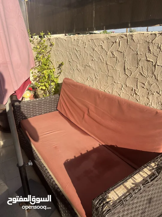 طقم راتان ومظلة ومرجيحة