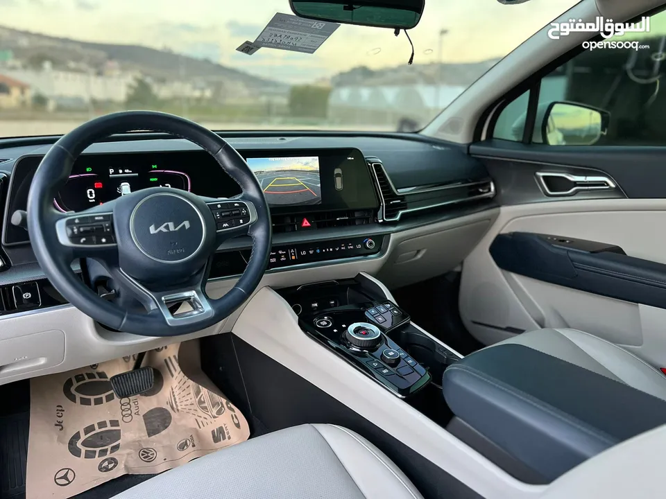 كايا سبورتاج /2022 فل بدون فتحة سقف  2x4 ///240Hp بنزين + كهرباء  ( Haybrid) 1600cc