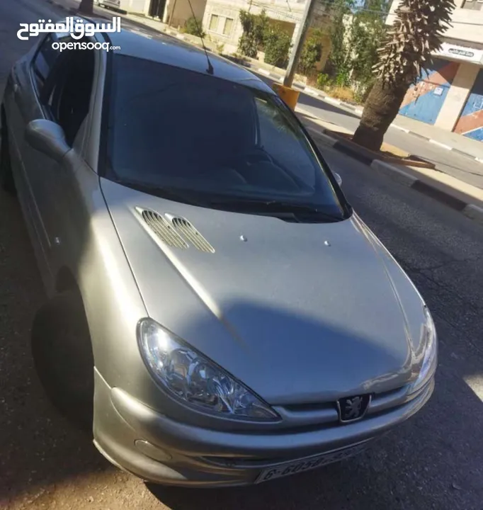 بيجو 206 اوتماتك لون فضي