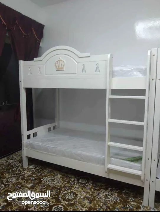 we have brand new wooden kids bunker bed available